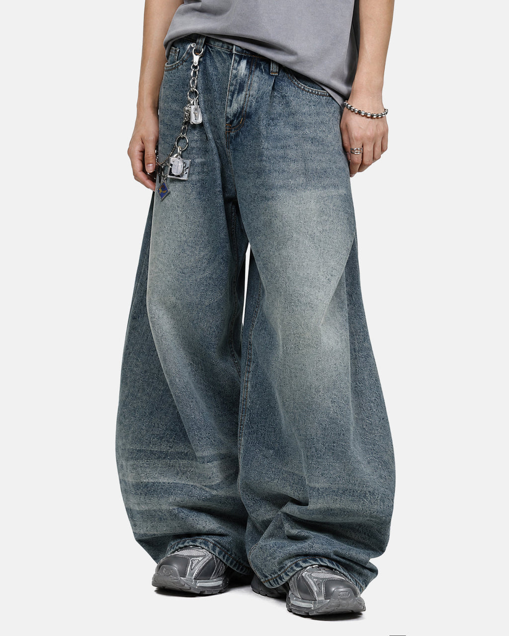 Blue Whisker Acid Washed Barrel Jeans by Flation Streetwear, showcasing relaxed fit and distressed denim style.
