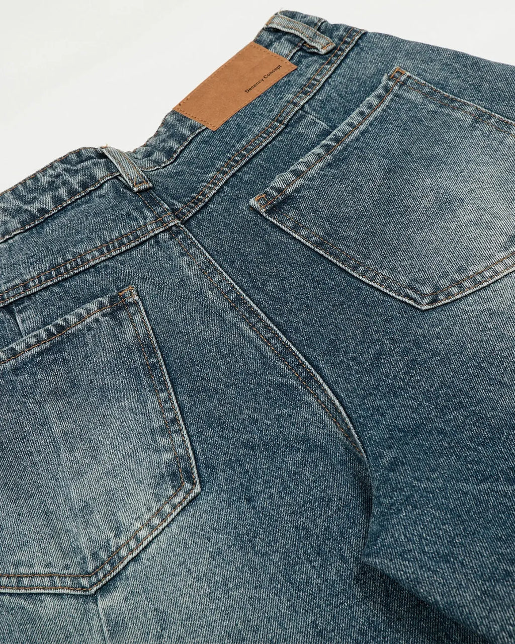 Blue Whisker Acid Washed Barrel Jeans by Flation Streetwear, featuring a relaxed fit and vintage-inspired wash on denim.