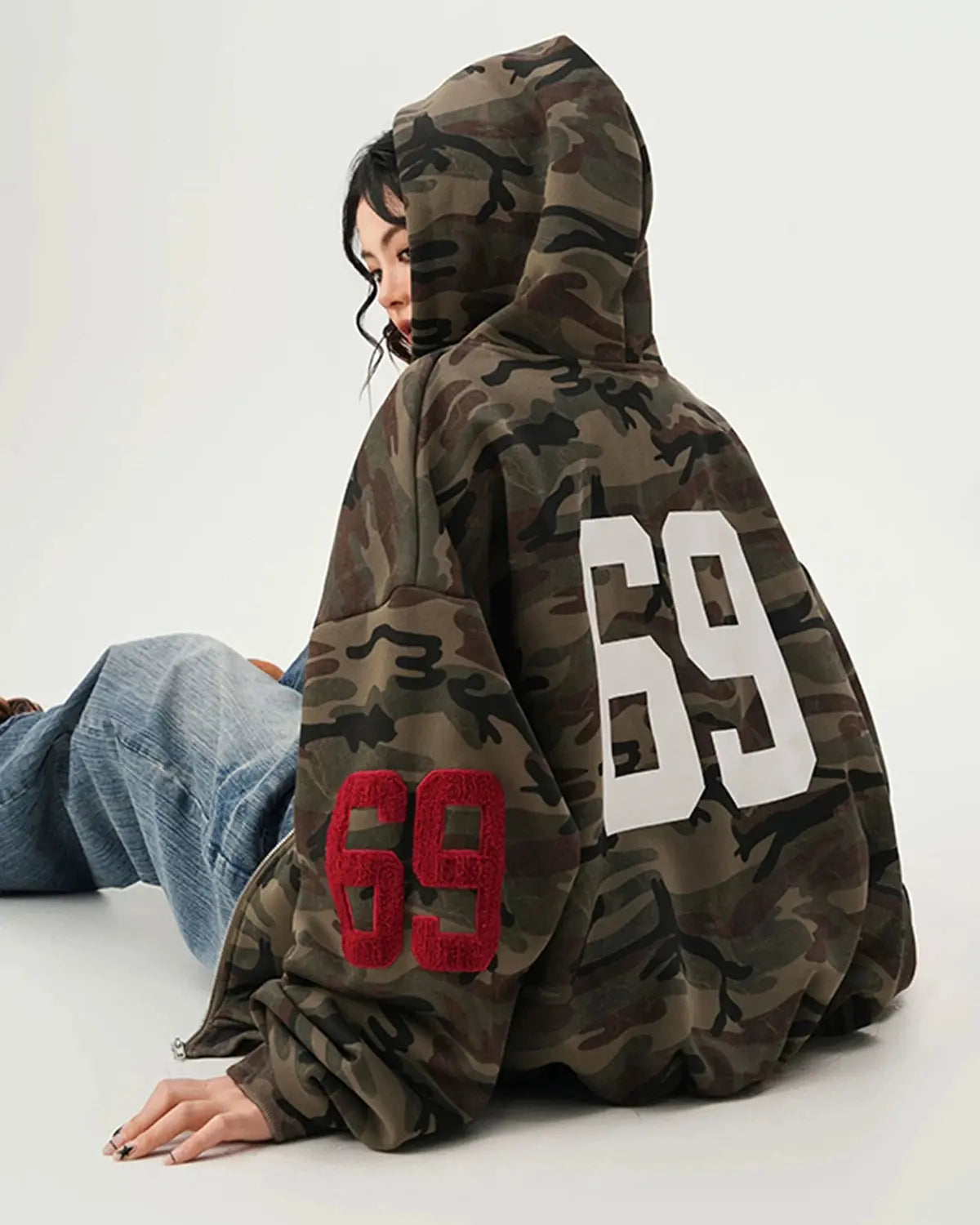 Flation camo zip-up hoodie with 69 applique embroidery, featuring a stylish streetwear design and front zipper closure.