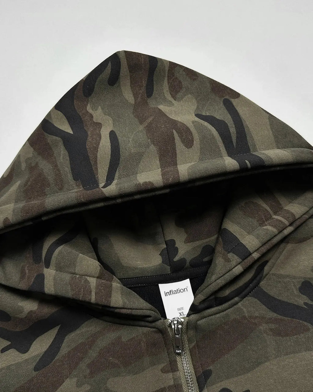 Camo zip-up hoodie from Flation Streetwear featuring 69 applique embroidery and camouflage pattern, casual streetwear style.