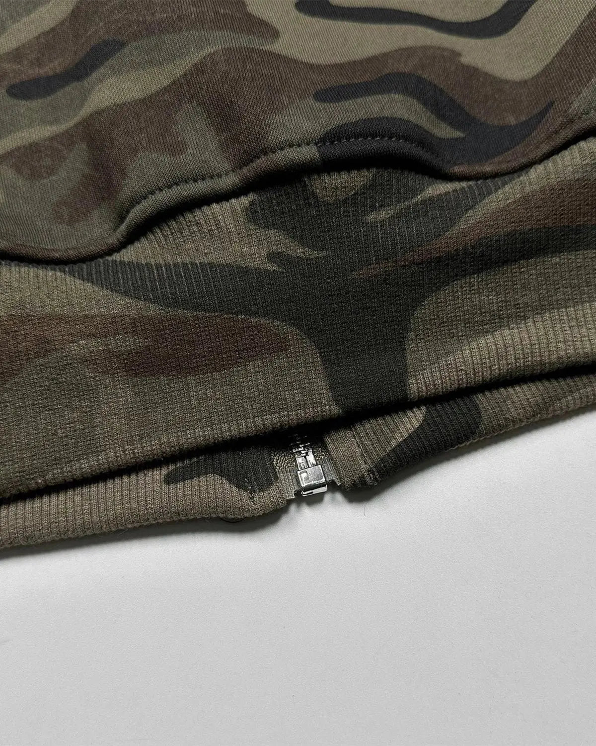 Flation camouflage zip-up hoodie with 69 applique embroidery, front pockets, and adjustable drawstrings, casual streetwear style.
