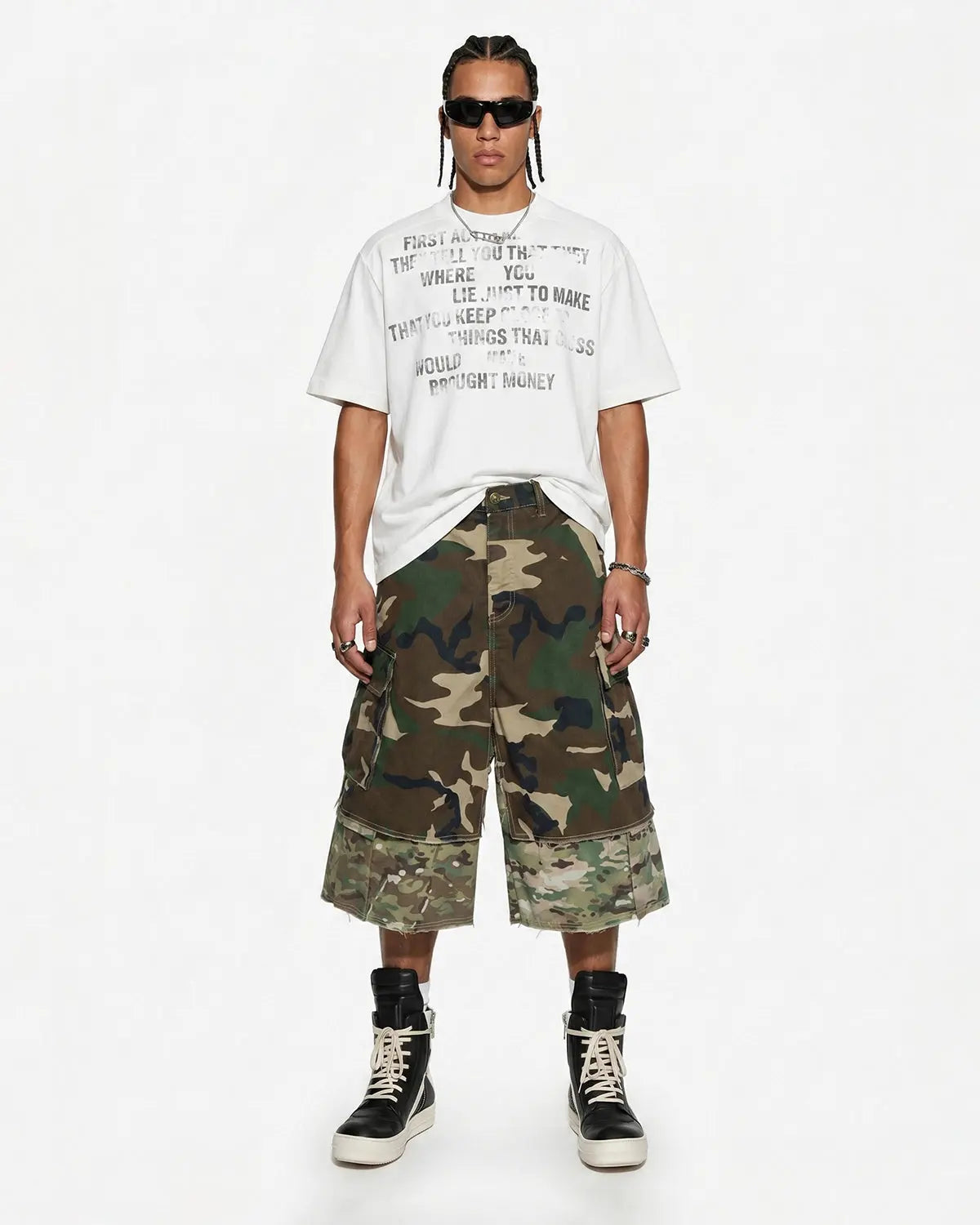 Camo layered longline jorts by Flation Streetwear featuring a relaxed fit and camouflage pattern, styled with casual streetwear appeal.