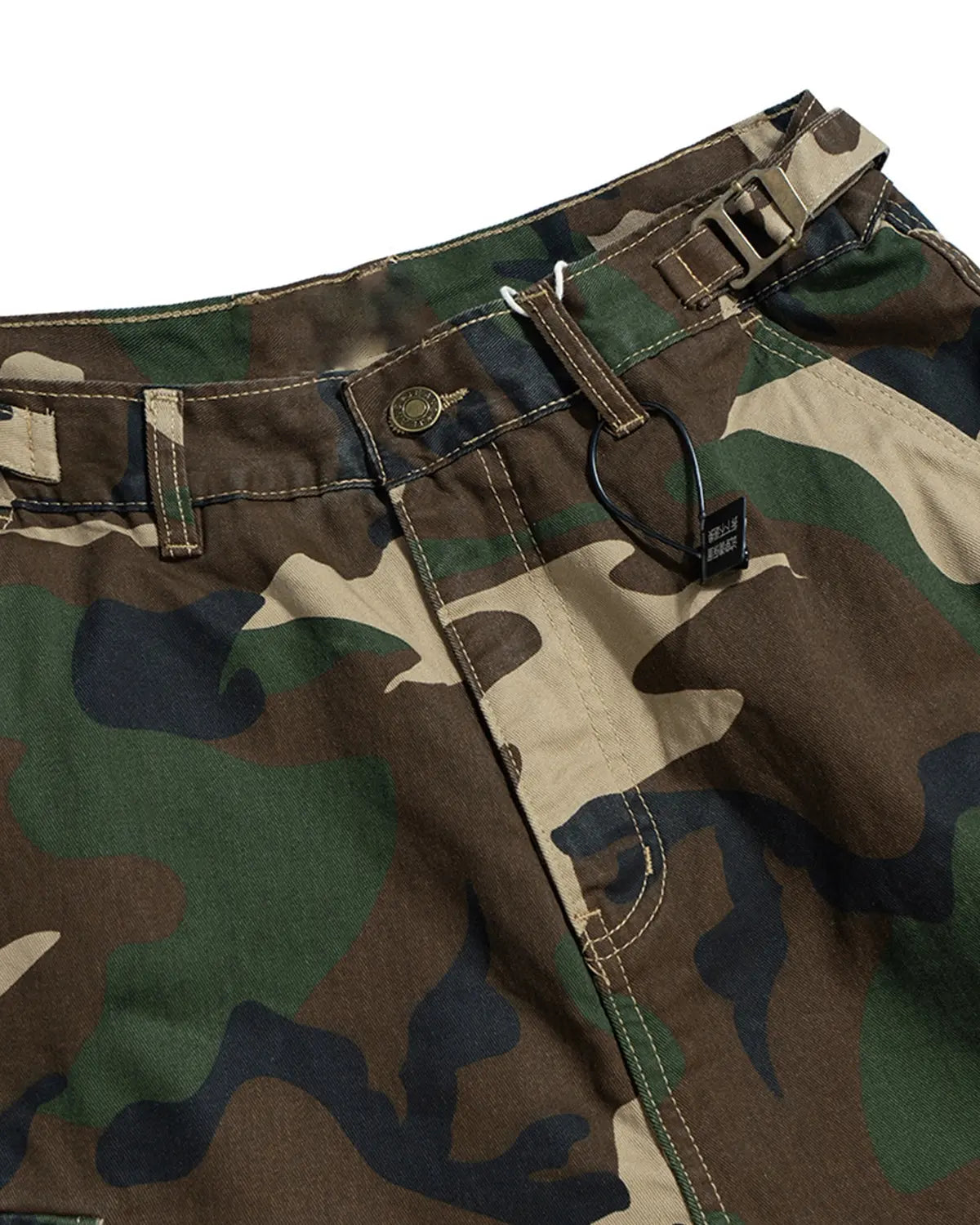 Camo layered longline jorts by Flation Streetwear featuring a relaxed fit with camo print and distressed denim design.