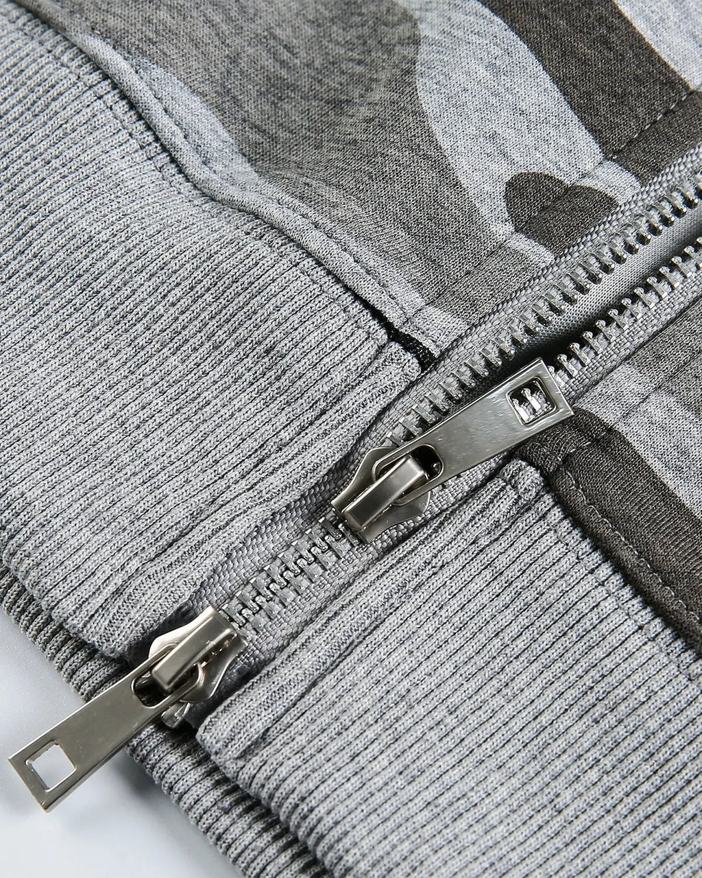 Cropped camouflage zip-up hoodie from Flation Streetwear featuring a green and brown camo pattern and adjustable hood.