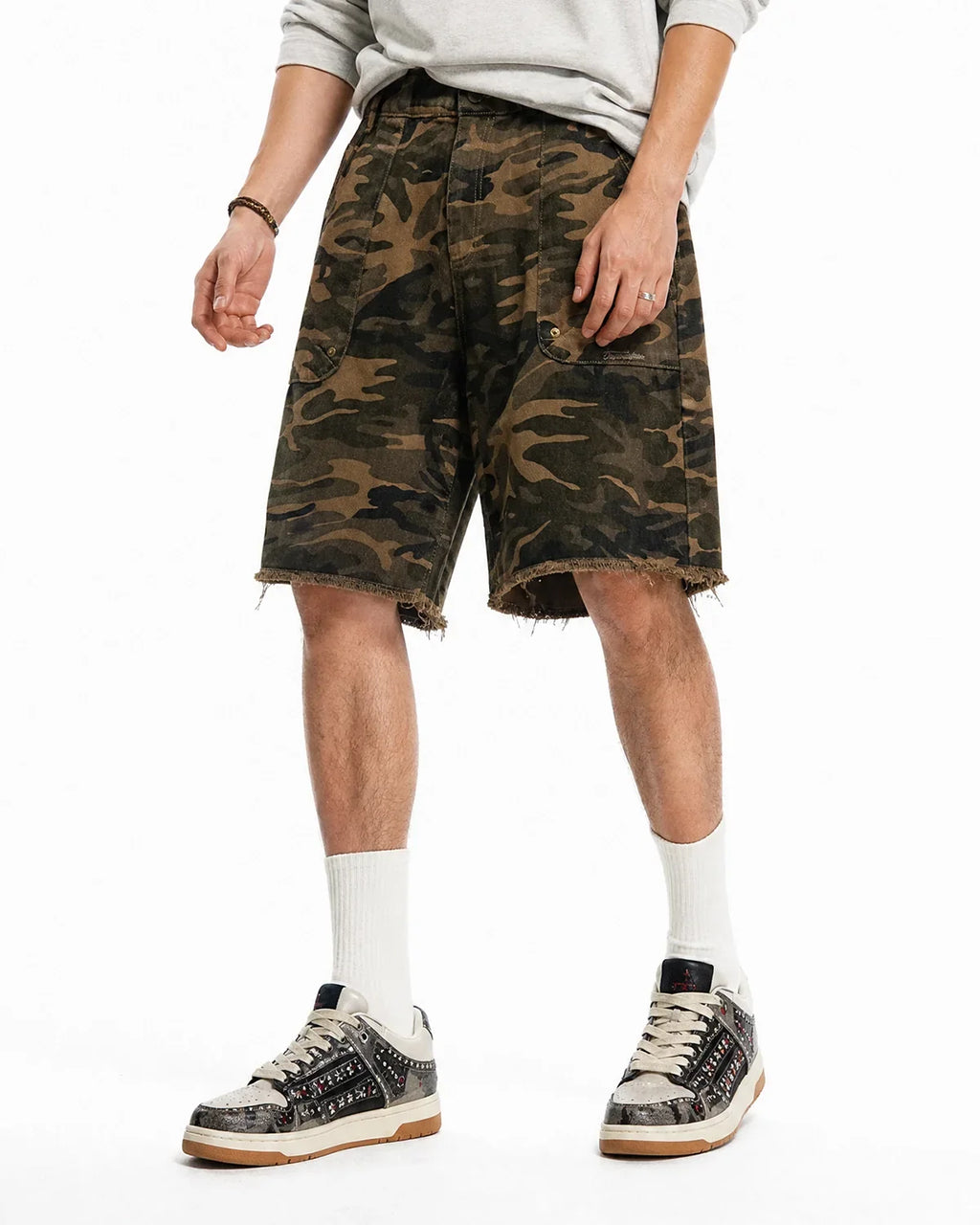 Frayed hem camo knee-length shorts by Flation Streetwear, featuring a stylish camouflage pattern and casual fit.