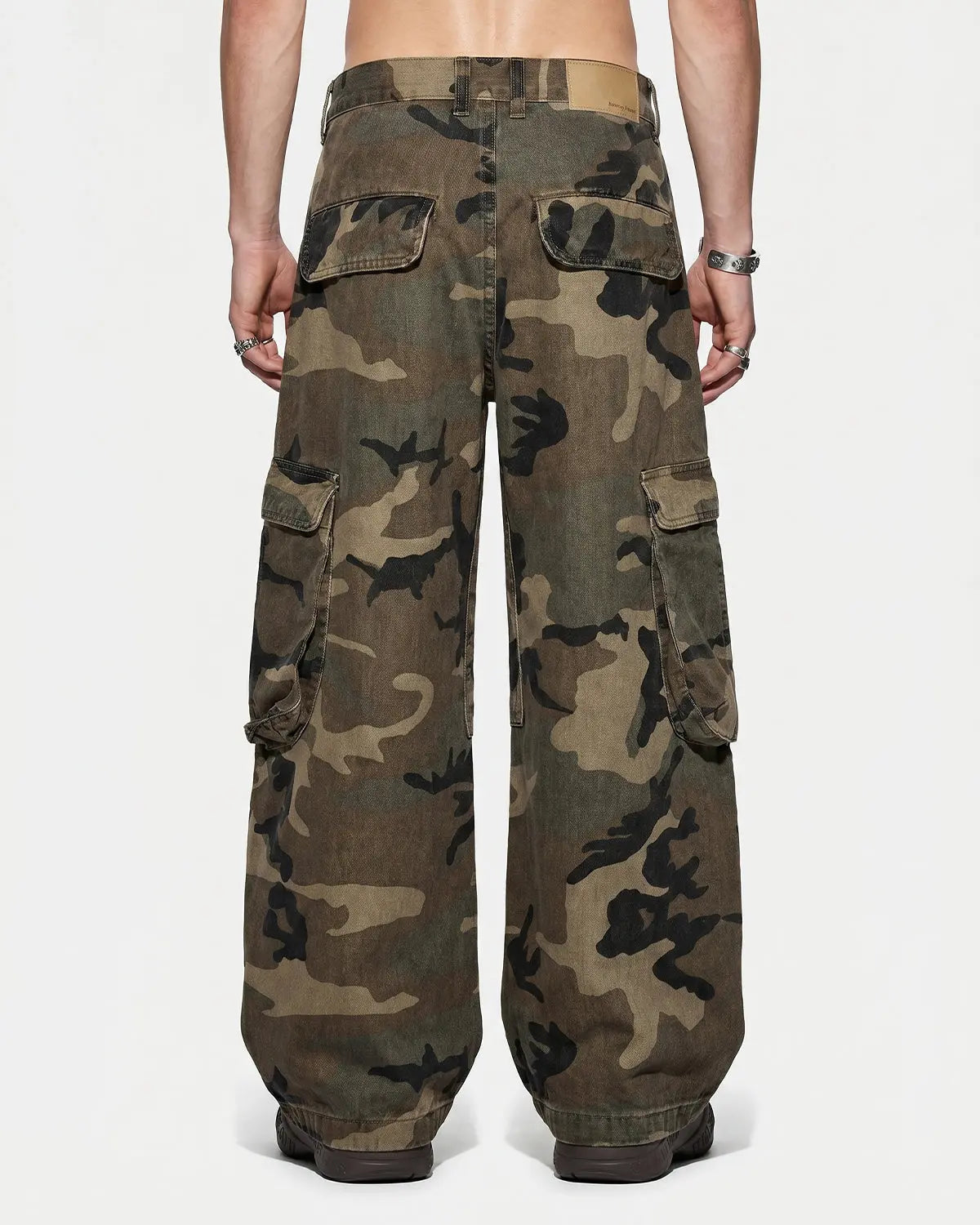 Dark camo cargo barrel pants by Flation Streetwear, featuring multiple pockets and relaxed fit for streetwear style.