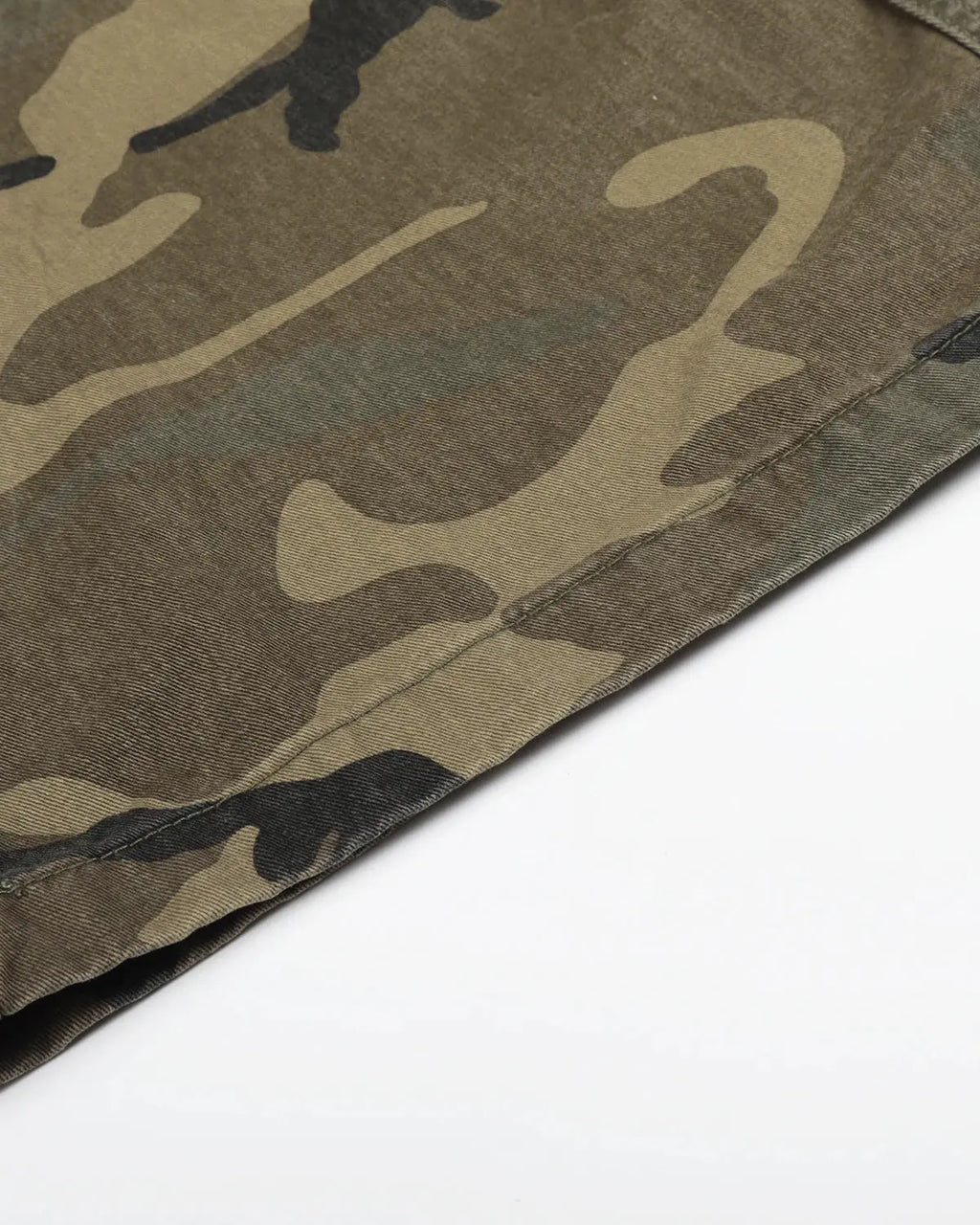 Camo cargo barrel pants by Flation featuring a relaxed fit, multiple pockets, and a stylish streetwear camouflage pattern.