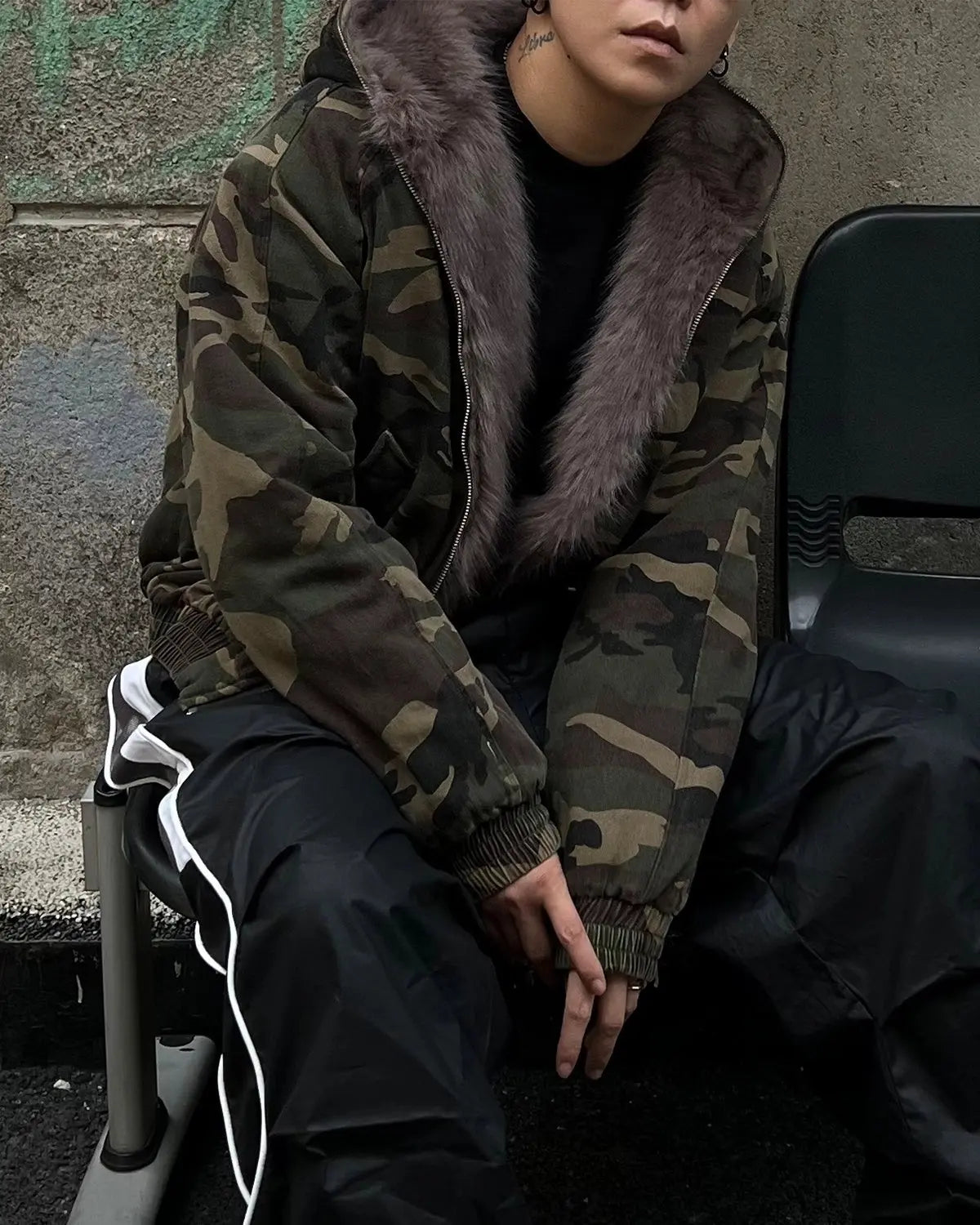 Camo faux fur-lined bomber jacket by Flation Streetwear, featuring camouflage pattern and cozy fur lining for a stylish look.