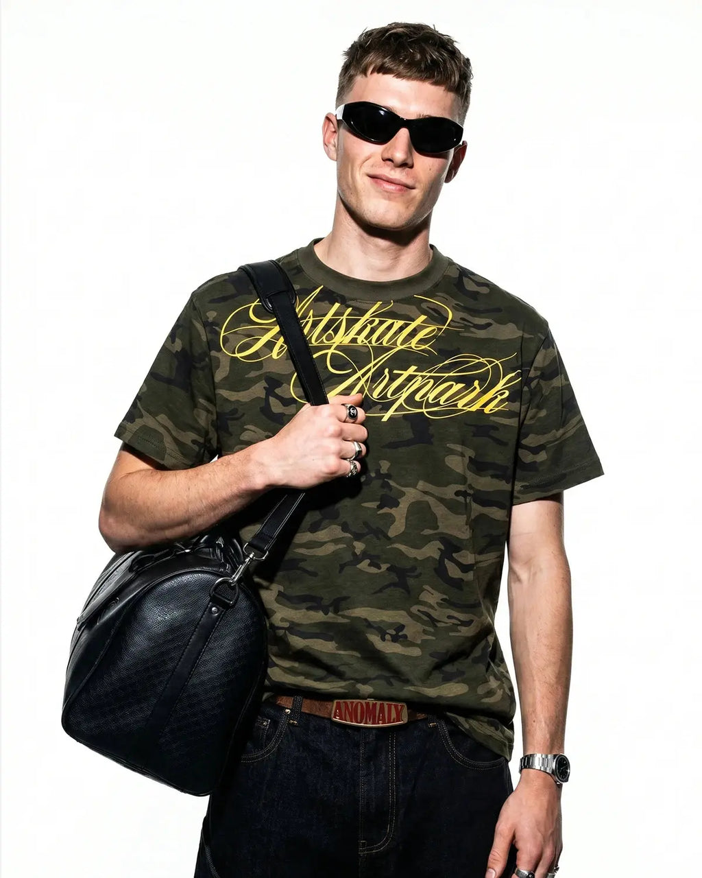 Camo Script Boxy T-Shirt by Flation Streetwear featuring a camouflage pattern and bold script logo on a relaxed fit tee.