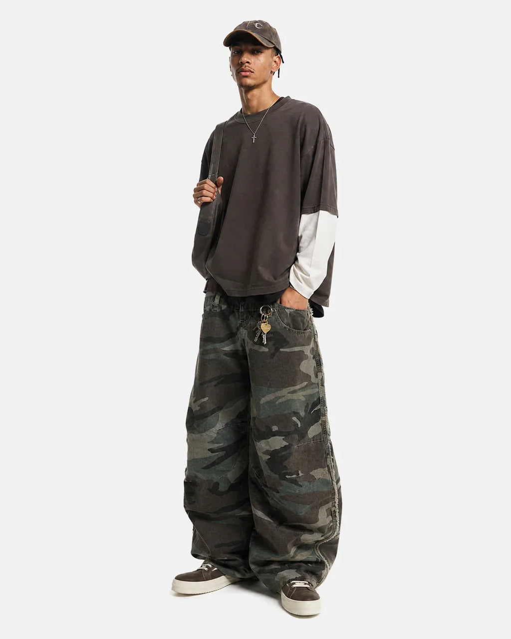 Double waist camo cargo pants by Flation Streetwear featuring multiple pockets and a military-inspired camo pattern.