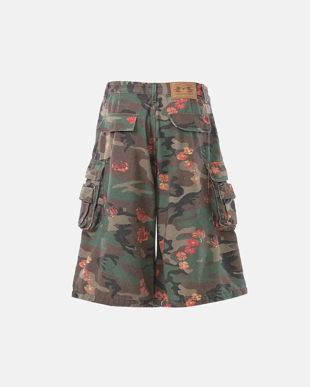 Flation floral camo cargo longline shorts with multiple pockets and relaxed fit, styled with a casual streetwear look.