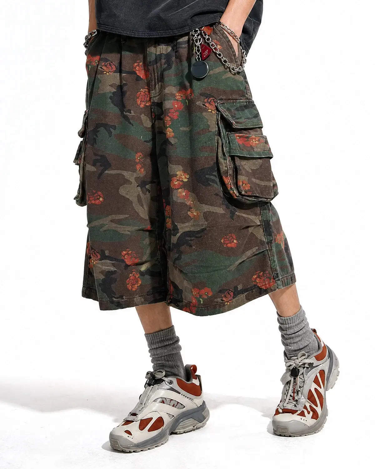 Flation floral camo cargo longline shorts featuring a mix of floral and camouflage patterns, designed for streetwear style.