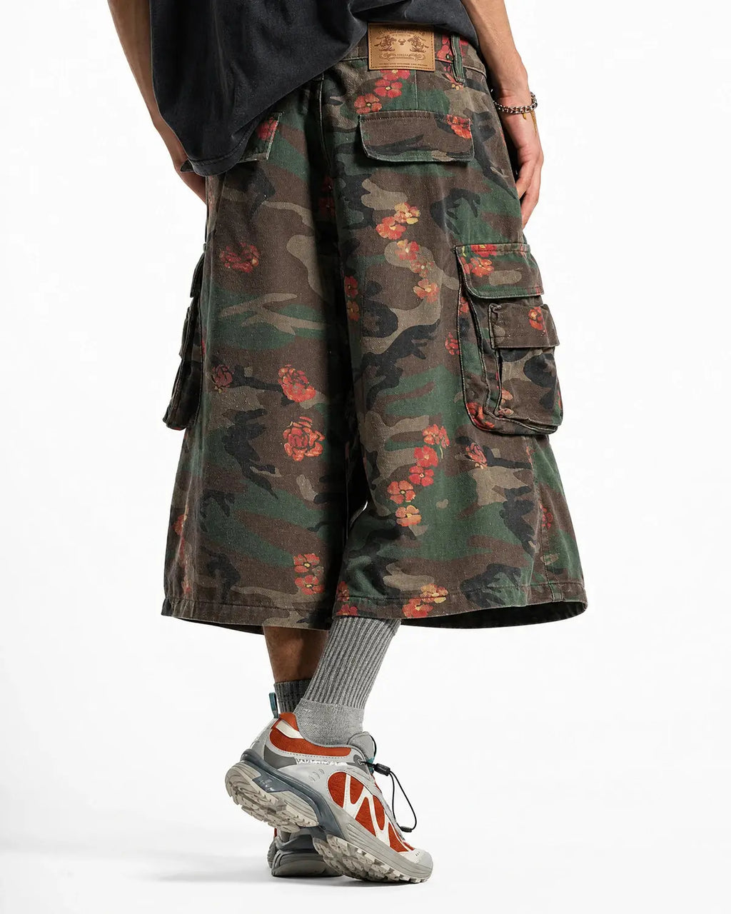 Flation Floral Camo Cargo Longline Shorts featuring a floral camo pattern, relaxed fit, and cargo pockets for streetwear style.