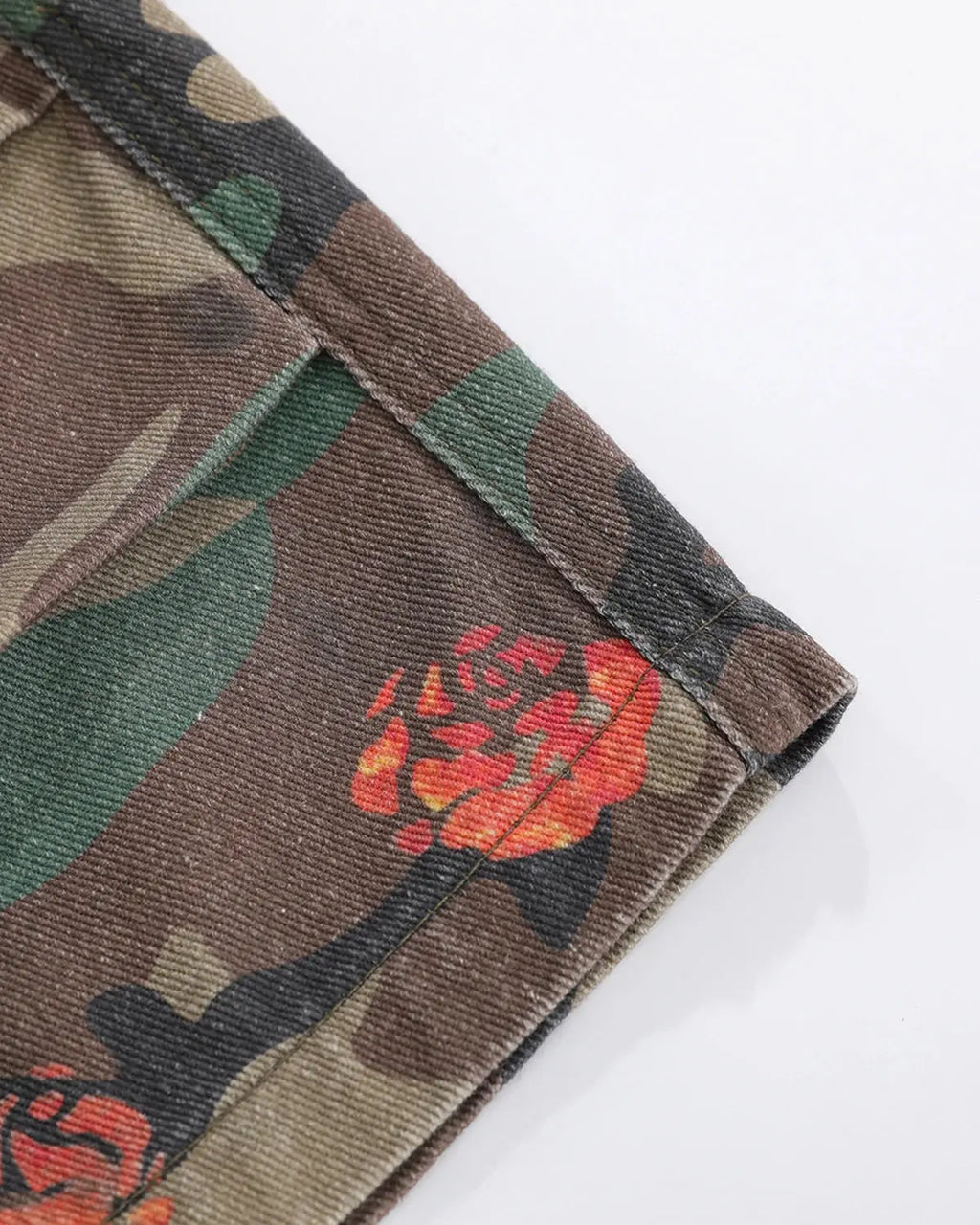 Flation floral camo cargo longline shorts featuring a mix of floral and camouflage patterns, casual streetwear style.