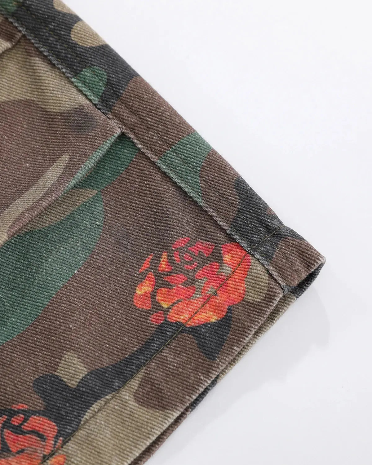 Flation floral camo cargo longline shorts featuring a mix of floral and camouflage patterns, casual streetwear style.