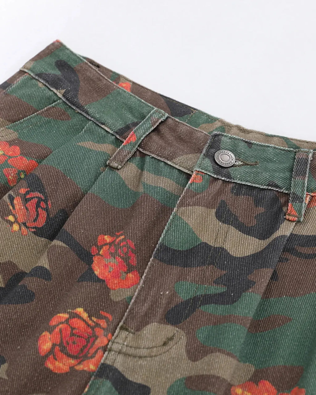 Flation floral camo cargo longline shorts with multiple pockets, casual streetwear style, featuring a vibrant camo floral pattern.