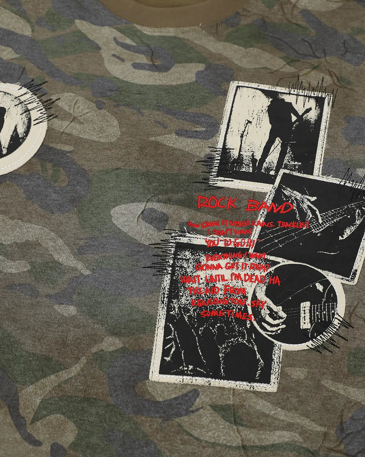 Vintage camo patch graphic T-shirt by Flation featuring camouflage pattern and streetwear style, shown on a person.