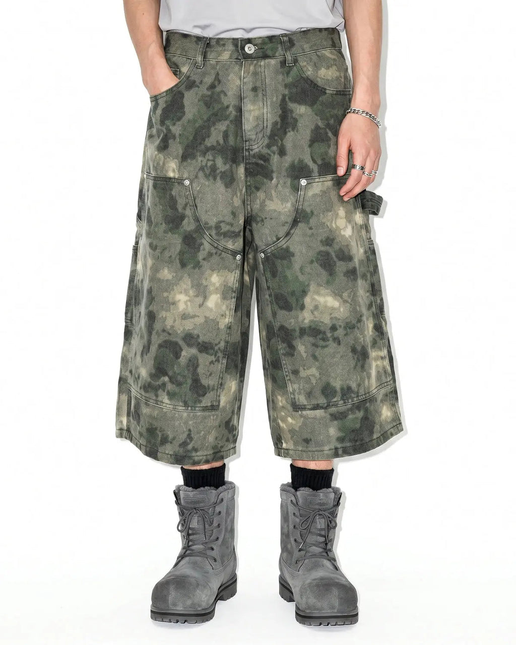 Washed camo cargo longline shorts by Flation Streetwear, featuring a relaxed fit and camouflage pattern, casual streetwear style.