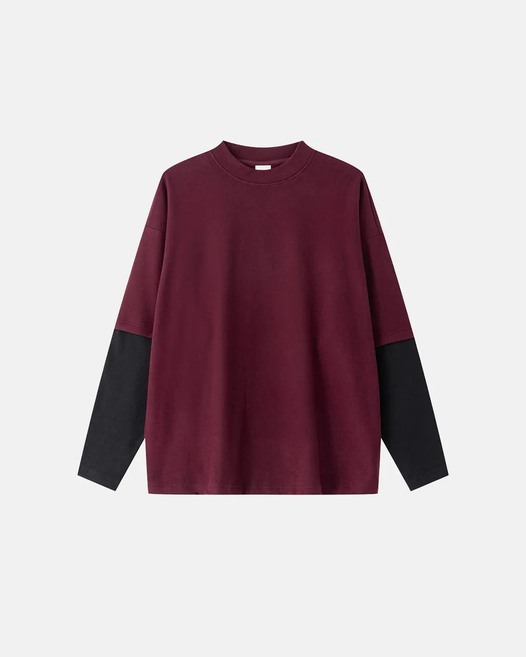 Color block long sleeve tee from Flation streetwear with bold color segments and a relaxed fit, shown on a model.