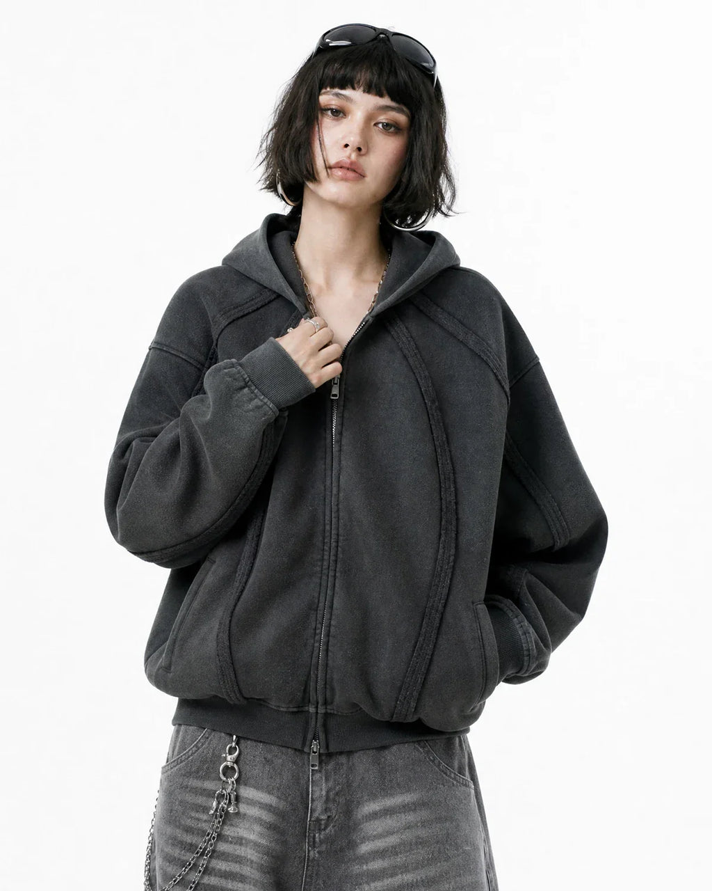 Dark grey Flation streetwear hoodie with snow-washed raw edges and a boxy fit, featuring a zip-up front and casual style.