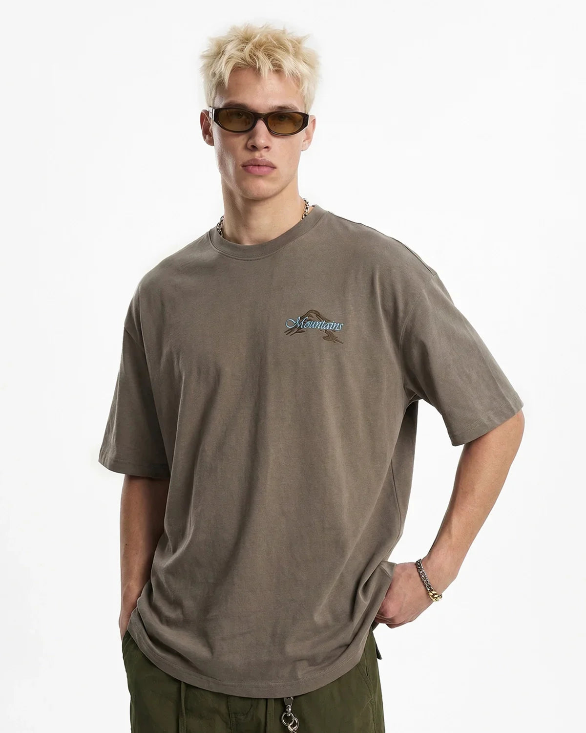 Dark grey heavyweight oversized graphic T-shirt by Flation Streetwear, featuring bold printed design on front.