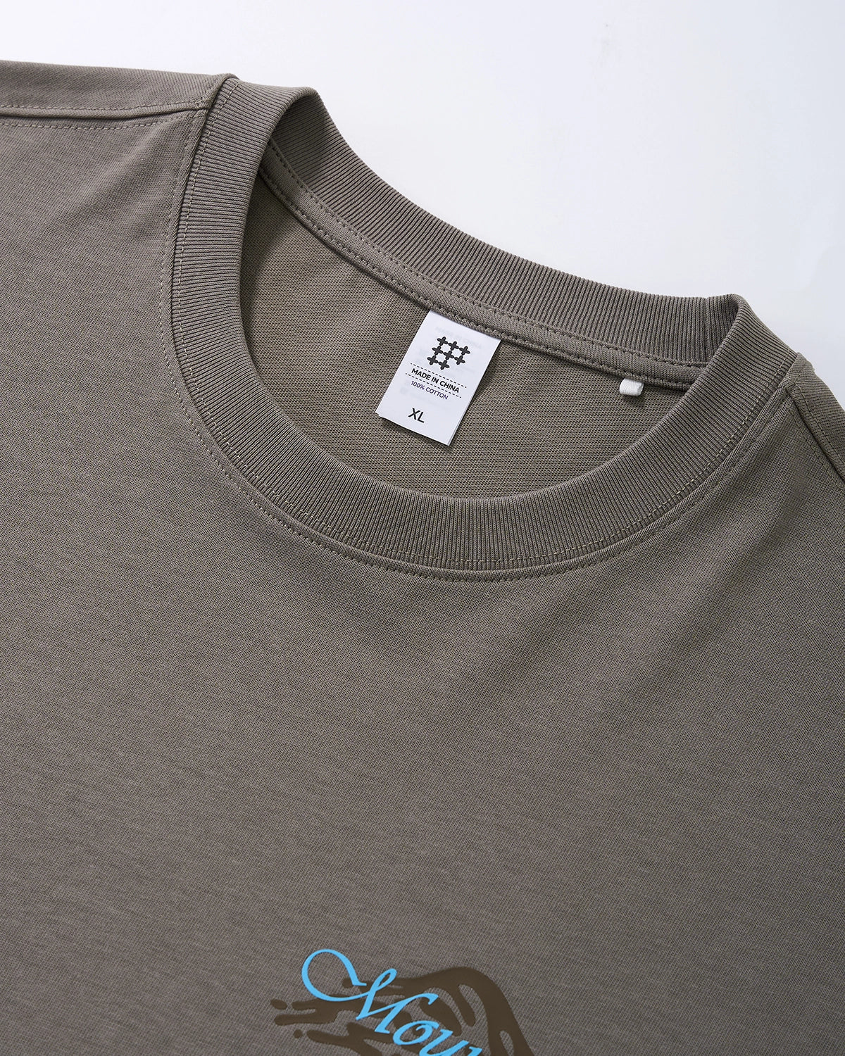 Dark grey heavyweight oversized graphic T-shirt by Flation Streetwear, featuring bold print and relaxed fit.