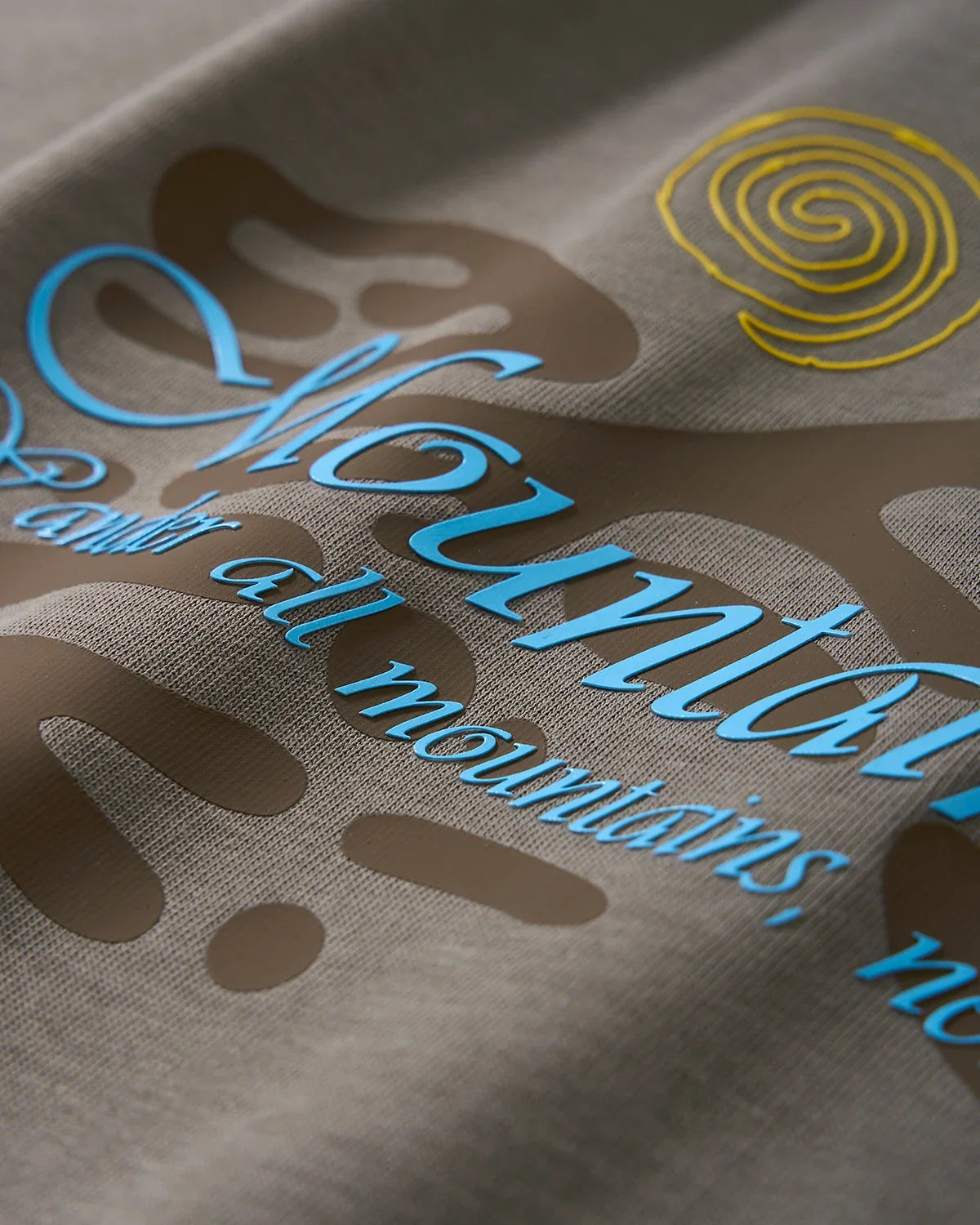 Dark grey heavyweight oversized graphic T-shirt by Flation Streetwear featuring bold street-style design.