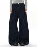 Dark indigo wide bootcut jeans by Flation Streetwear, featuring classic denim style and a relaxed fit.