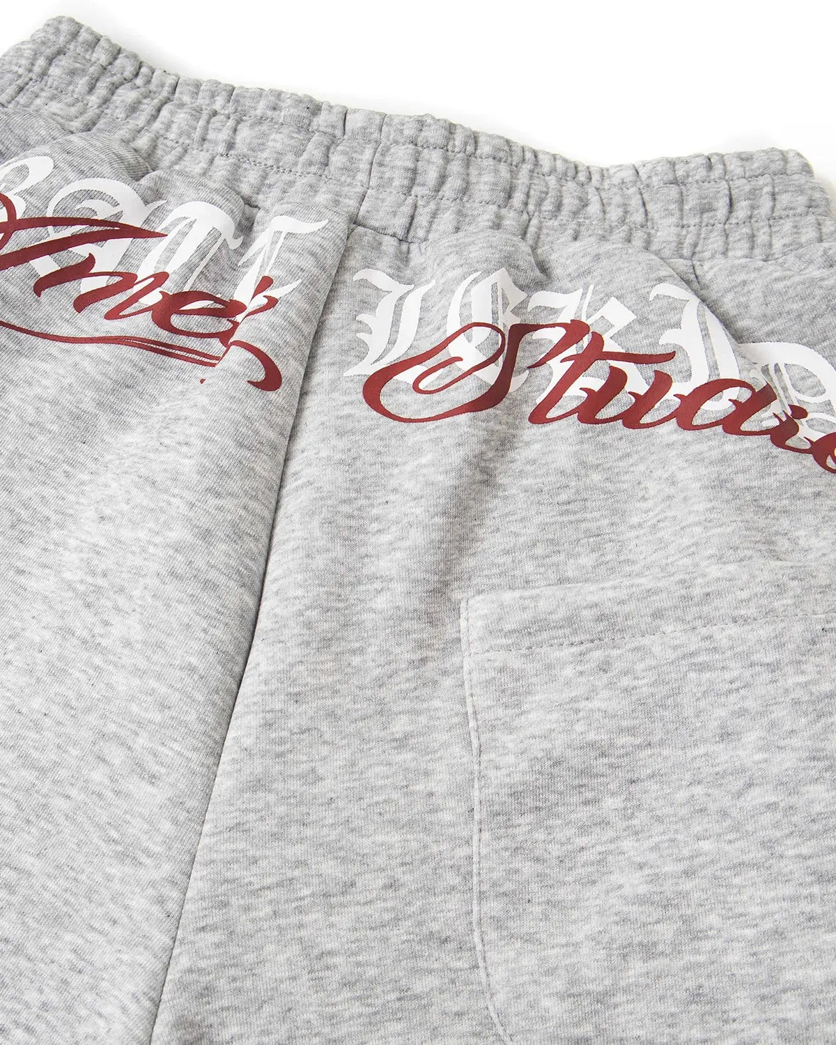 Gray Flation Streetwear cross print baggy sweatpants with relaxed fit and elastic waistband, featuring bold cross design.