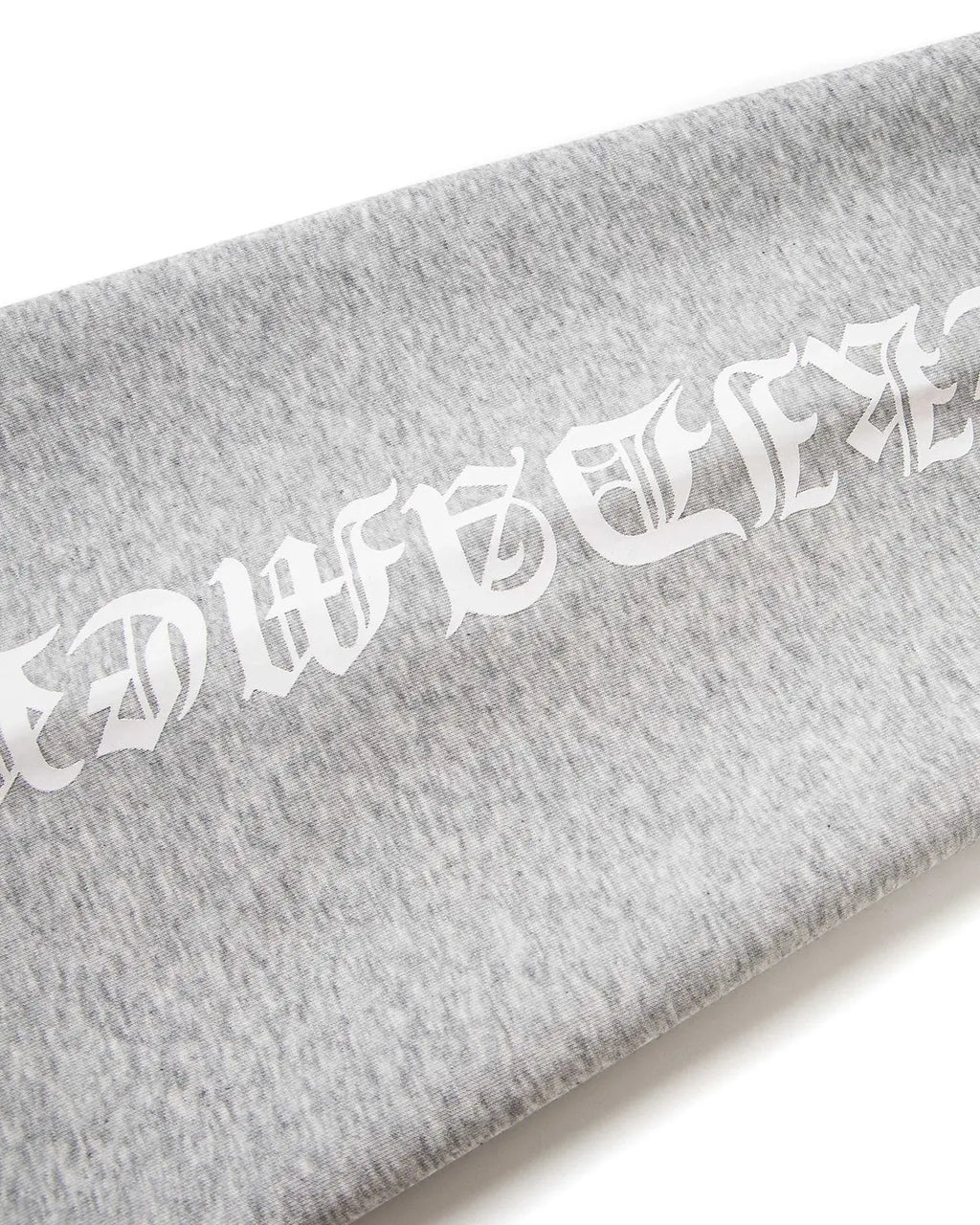 Gray Flation streetwear baggy sweatpants with black cross print, relaxed fit and adjustable waistband.