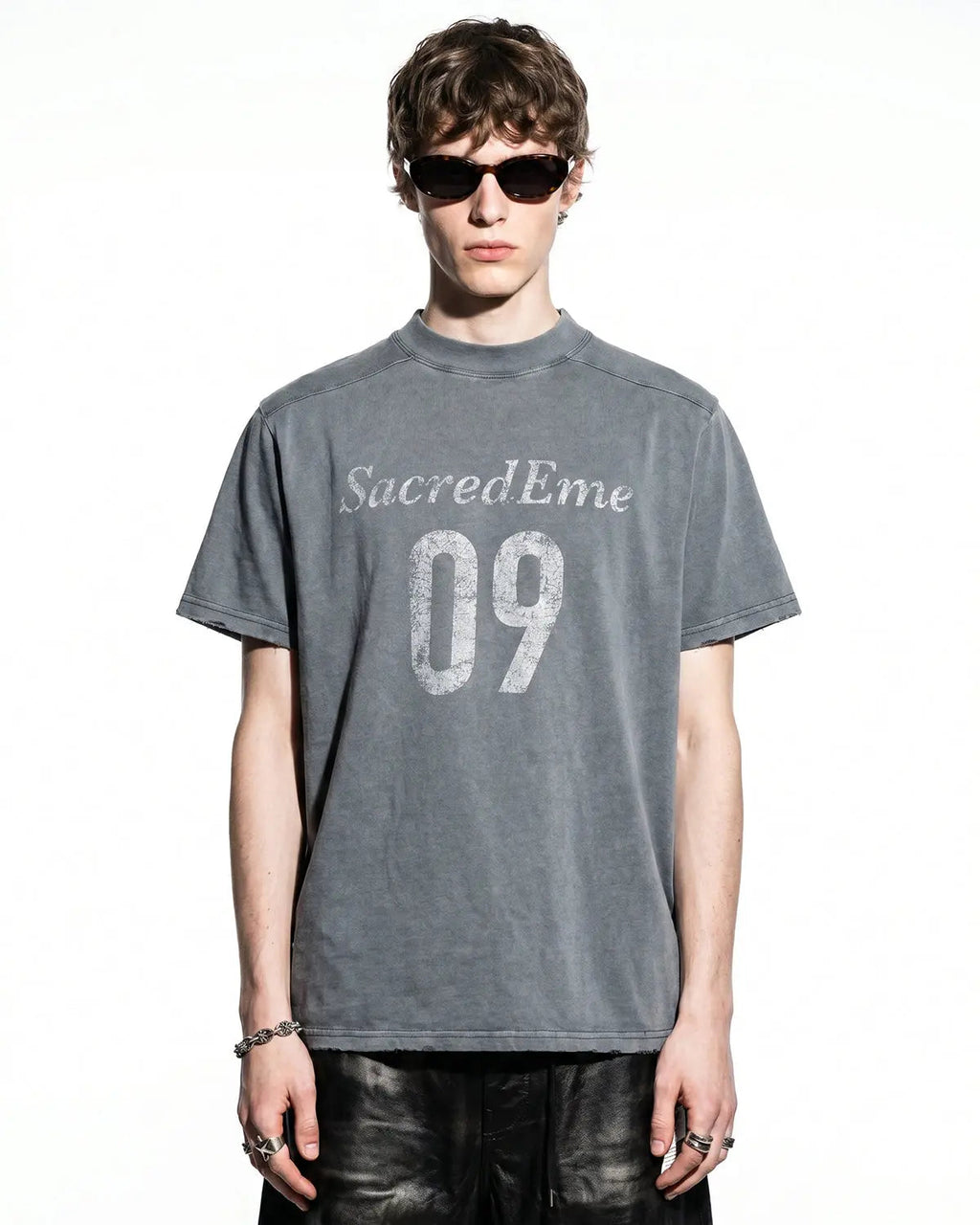 Gray distressed spray wash graphic T-shirt by Flation Streetwear featuring bold urban print and casual fit.
