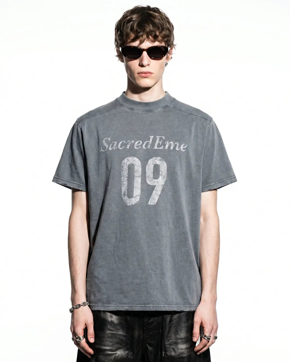 Gray distressed spray wash graphic T-shirt by Flation Streetwear featuring bold urban print and casual fit.