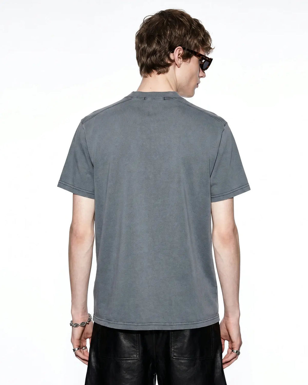 Gray distressed spray wash graphic T-shirt by Flation Streetwear, featuring bold urban streetwear style and graphic print.
