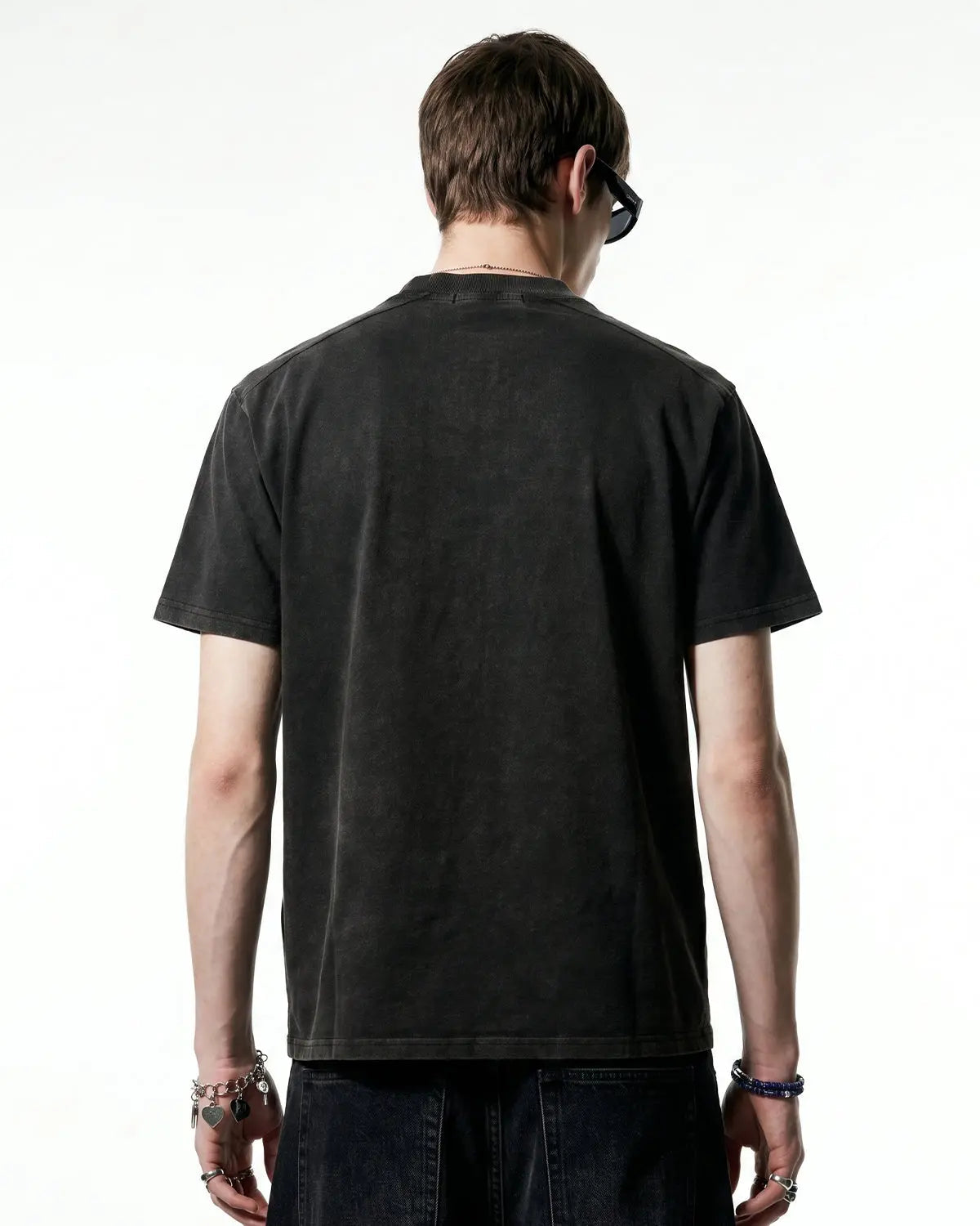 Grey distressed spray wash graphic T-shirt by Flation Streetwear, featuring bold urban-style print and casual fit.