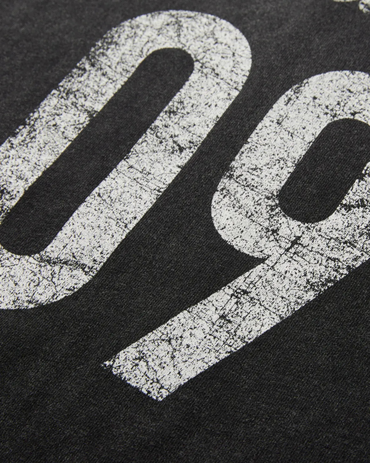 Gray distressed spray wash graphic T-shirt by Flation Streetwear, featuring bold urban design and casual fit.