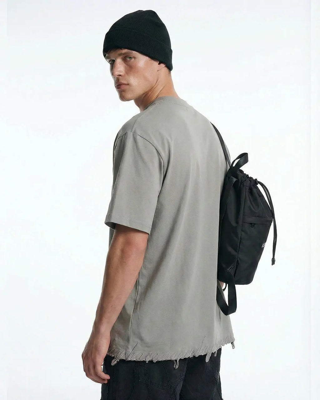 Grey oversized T-shirt by Flation with embroidered design and frayed hem, streetwear style, casual and comfortable fit.