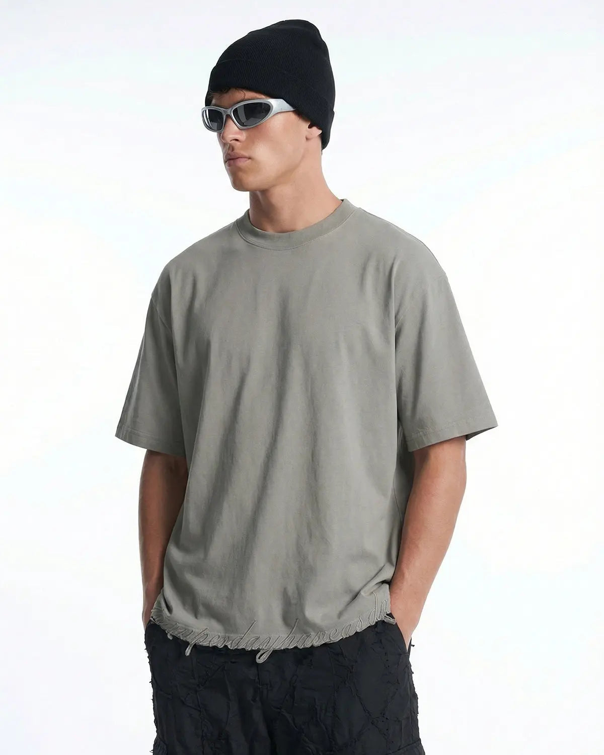 Gray embroidered frayed hem oversized T-shirt by Flation Streetwear, featuring relaxed fit and detailed needlework.
