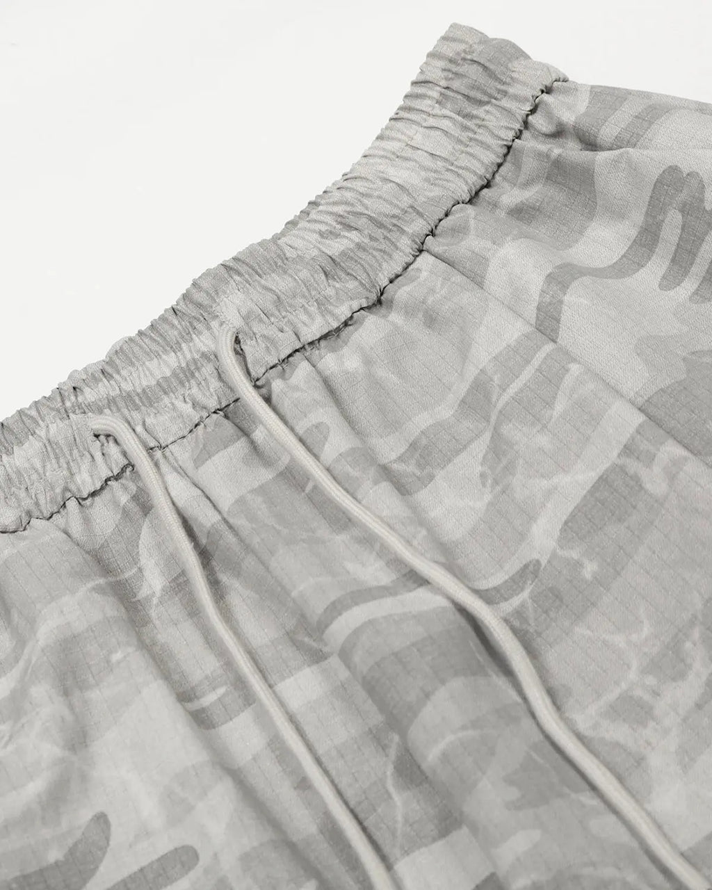 Gray camouflage cargo barrel pants by Flation Streetwear, featuring multiple pockets and a relaxed fit.