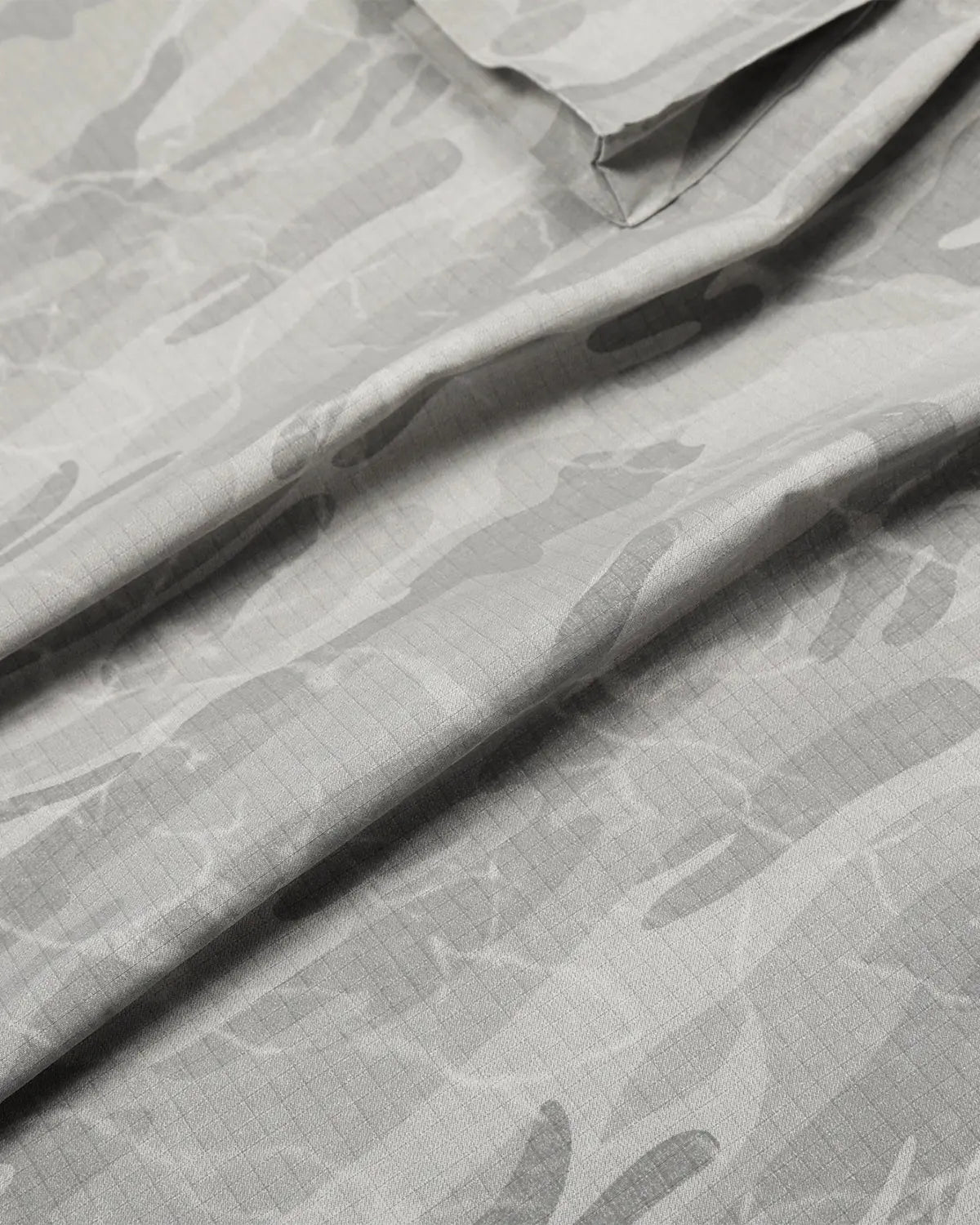 Gray camouflage cargo barrel pants by Flation Streetwear, featuring multiple pockets and a relaxed fit.