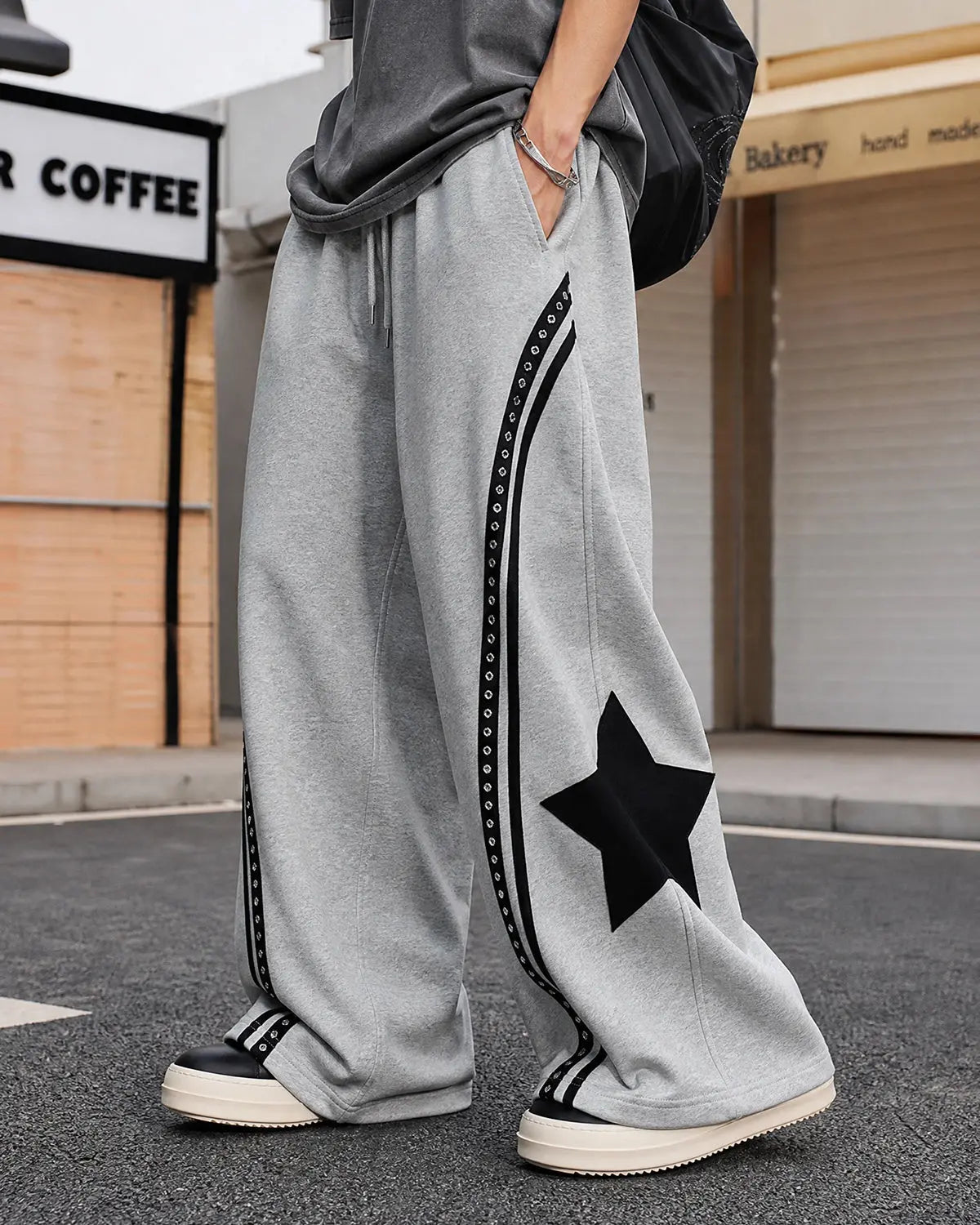 Grey contrast patchwork barrel sweatpants by Flation Streetwear with a relaxed fit and stylish design.