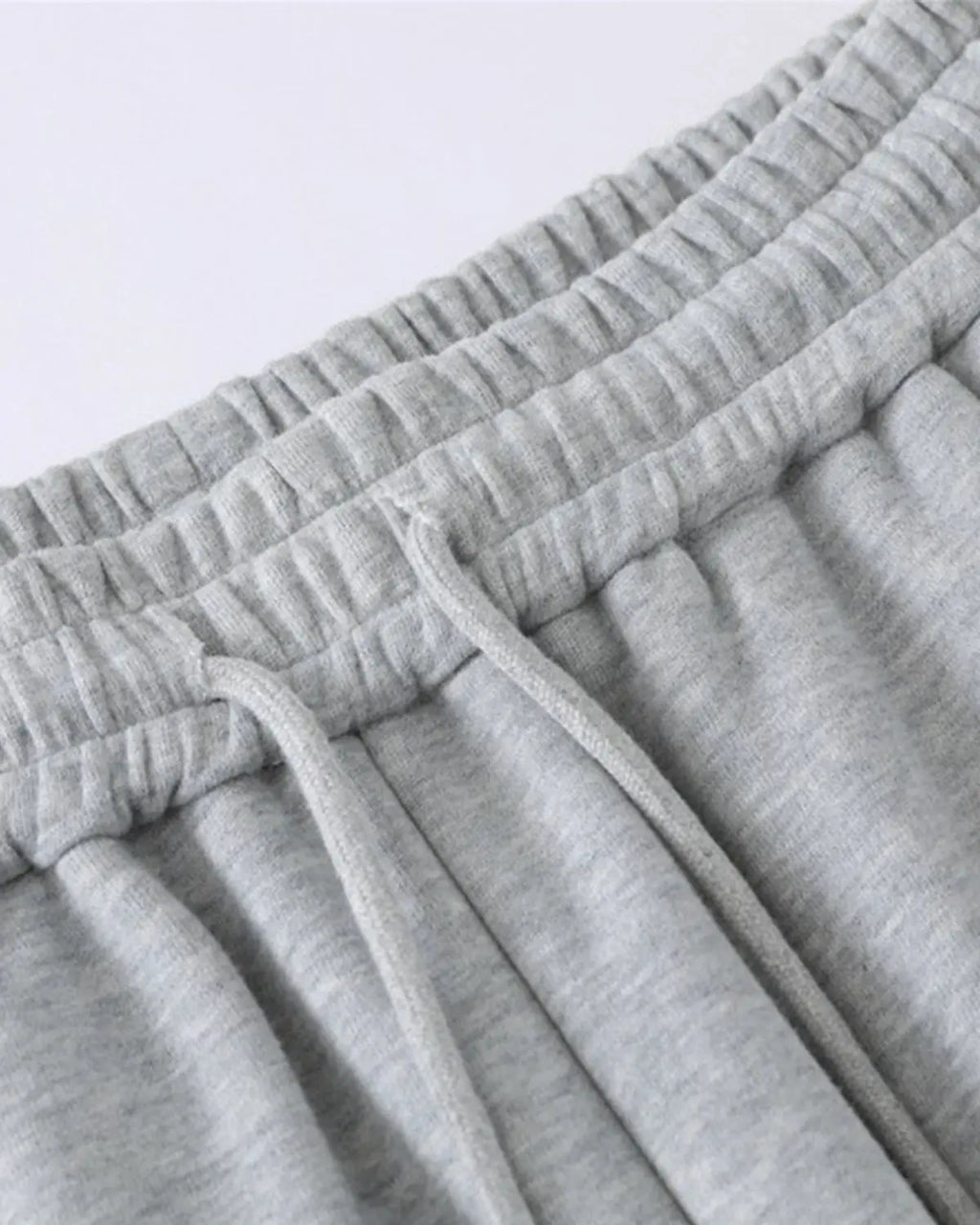 Gray contrast patchwork barrel sweatpants by Flation Streetwear with relaxed fit and stylish design.