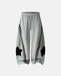 Gray contrast patchwork barrel sweatpants by Flation Streetwear, featuring relaxed fit and stylish design.