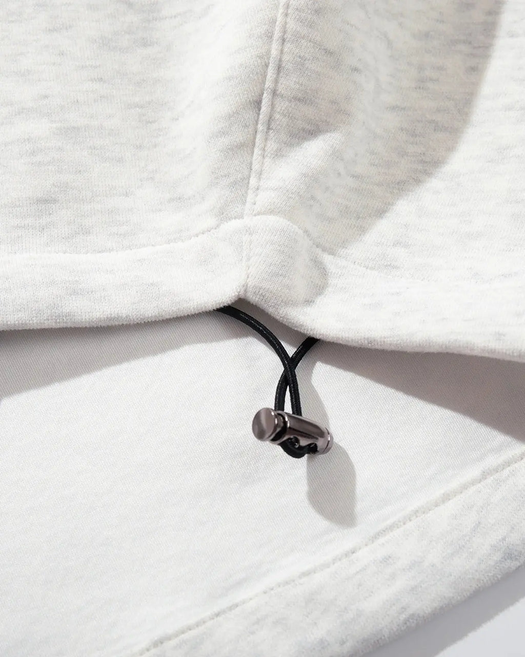 Grey Gothic Script Baggy Sweatpants by Flation Streetwear with bold black lettering and a relaxed, oversized fit.