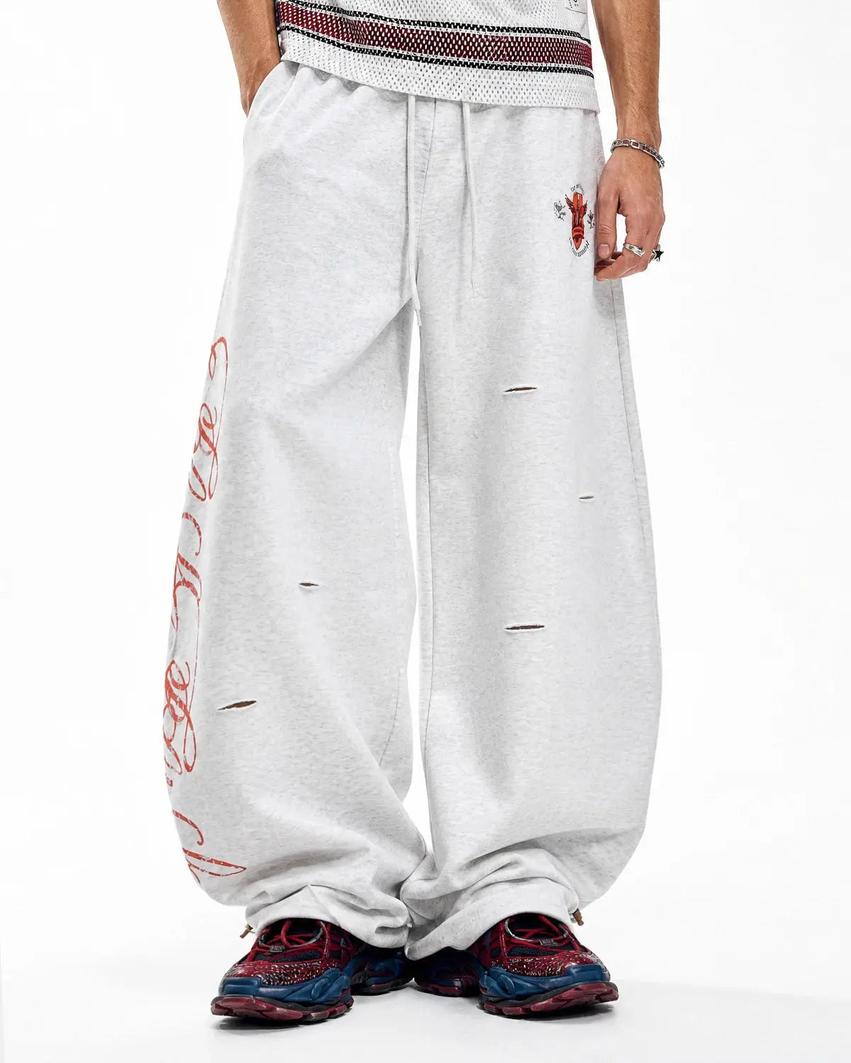 Gray vintage washed barrel sweatpants by Flation Streetwear, featuring a relaxed fit and casual streetwear style.