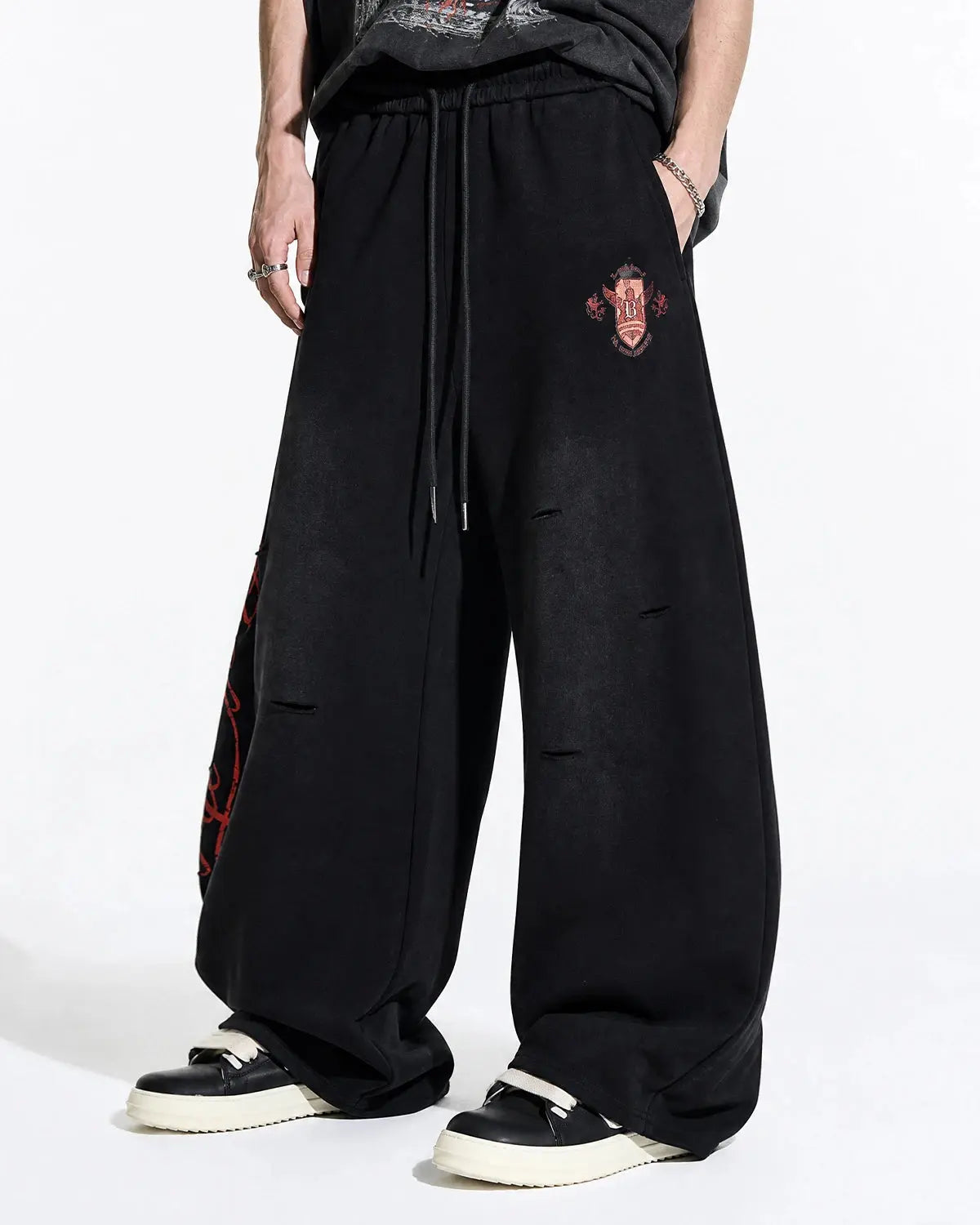 Grey vintage washed barrel sweatpants by Flation Streetwear, relaxed fit with a casual, worn-in look.