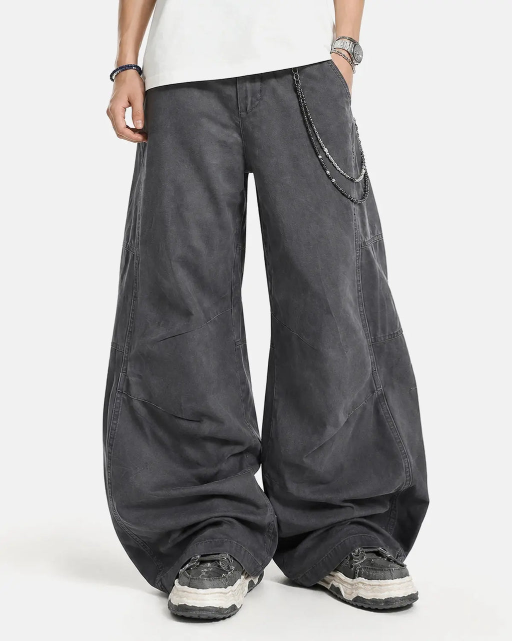 Gray washed curved seam cargo pants by Flation Streetwear, featuring a relaxed fit and multiple utility pockets.