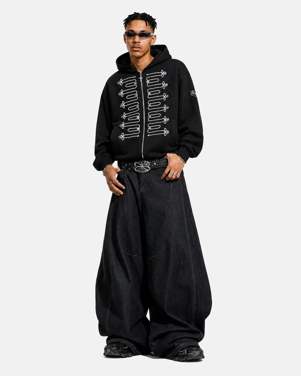 Black braided embroidery boxy zip-up hoodie by Flation Streetwear, featuring a relaxed fit and front zipper detail.