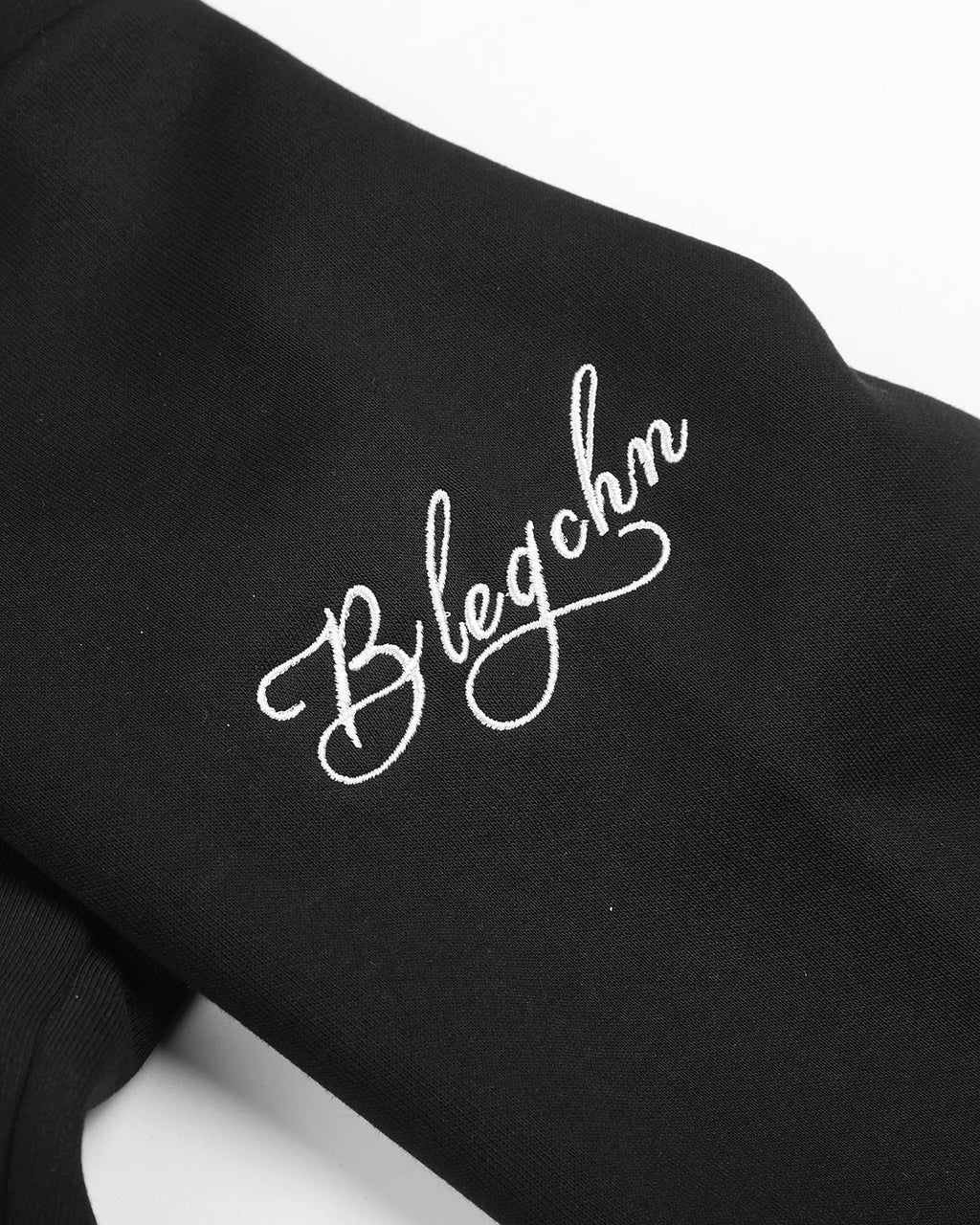 Black braided embroidery boxy zip-up hoodie by Flation Streetwear, featuring a casual fit and stylish design.