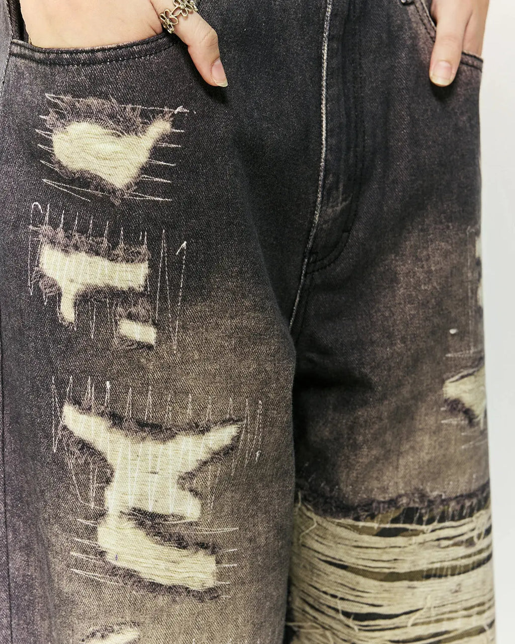 Baggy camo digital print jeans by Flation Streetwear, shown in XS size with relaxed fit and bold camo design.