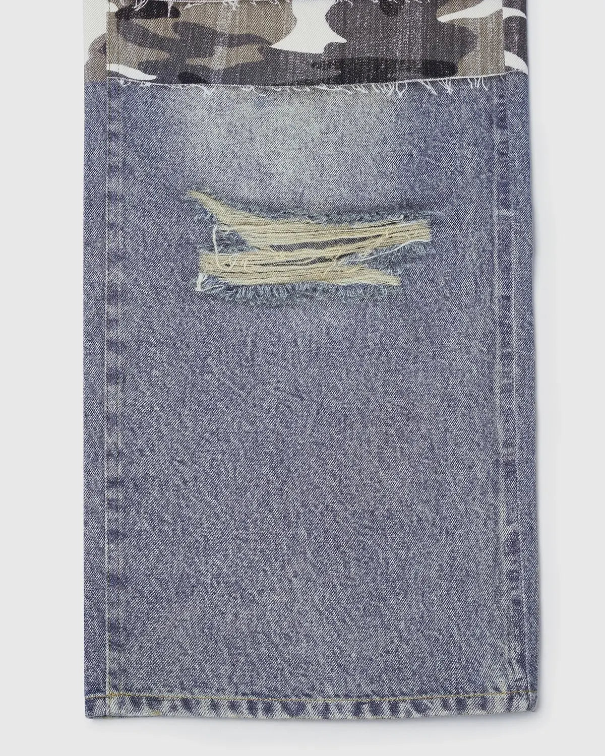 Patchwork print baggy jeans from Flation Streetwear featuring a colorful patchwork effect and relaxed fit, denim fabric.